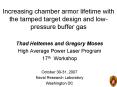 Increasing chamber armor lifetime with the tamped target design and lowpressure buffer gas