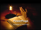  Power Point Template of - raying next to the bible by candle light. Only light in this image is from the candle. Perfect for  - Royalty Free PPT